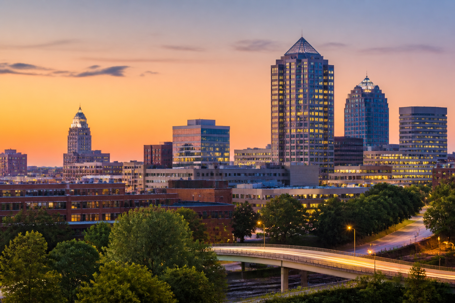 Greensboro skyline at dusk, symbolizing local business growth with reliable IT