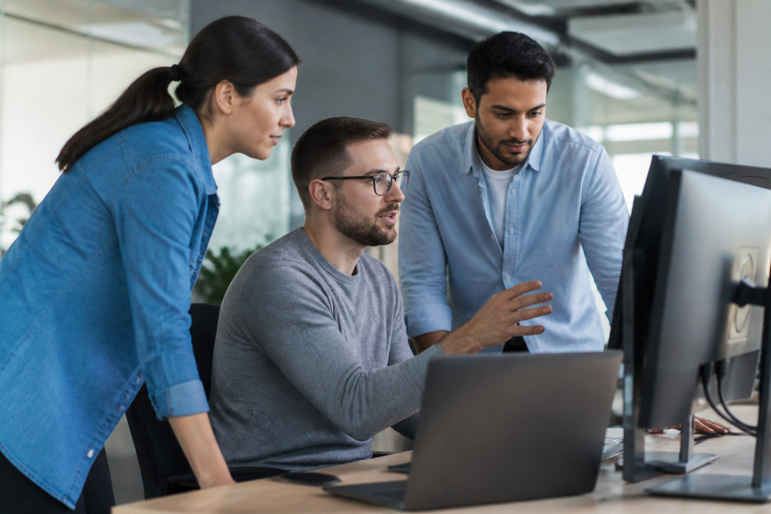 IT professionals collaborating in an office setting